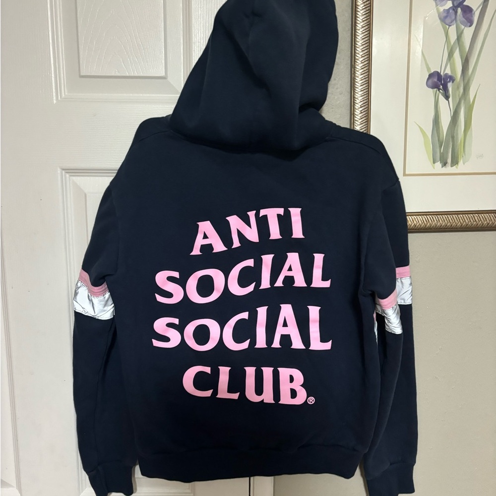 It’s an anti social social club hoodie. It’s unisex size medium